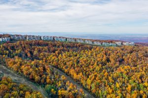 aerial view of condos along mountain ridge